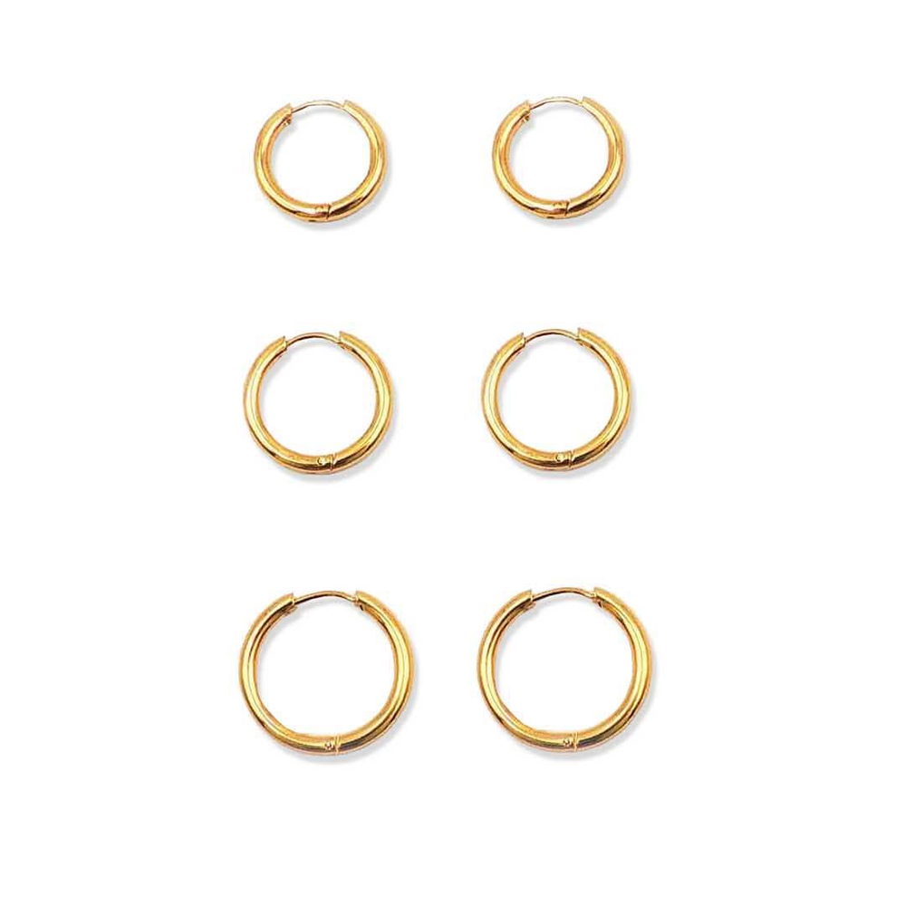 Six plain polished gold-tone huggie earrings on a plain white background